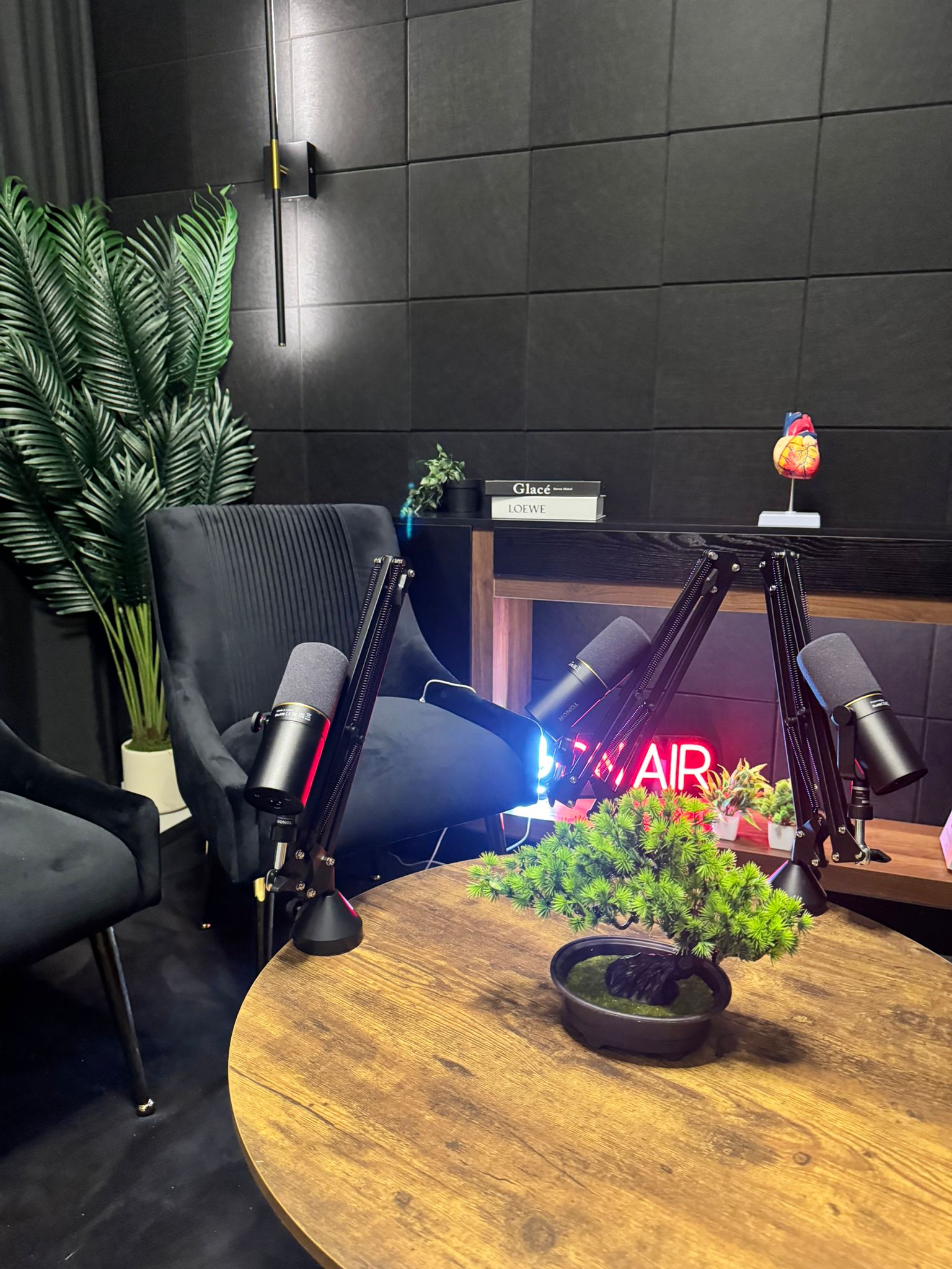 Podcast mics and velvet chair at Studio 309 Dubai